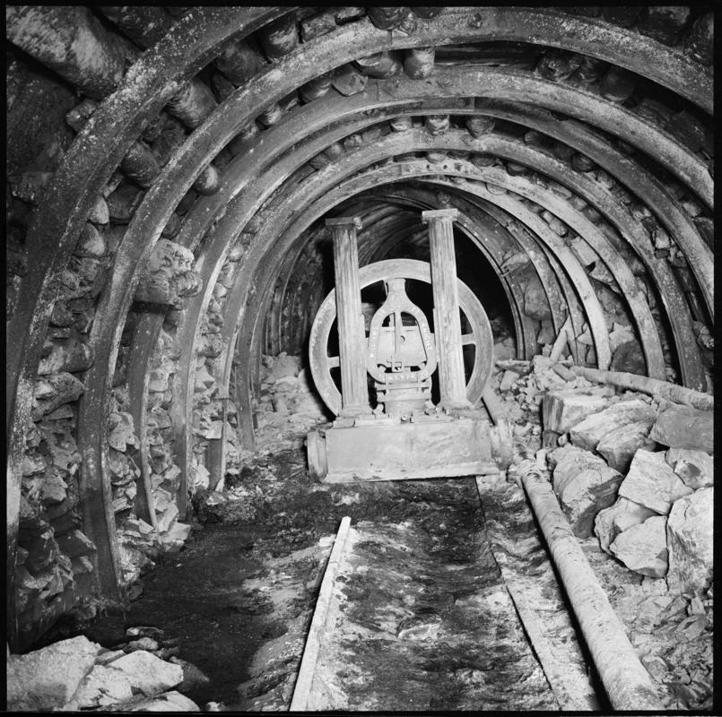 Black and white film negative showing the Old Steam pump made by Williams Knight of Pontypridd, underground at Deep Navigation Colliery.