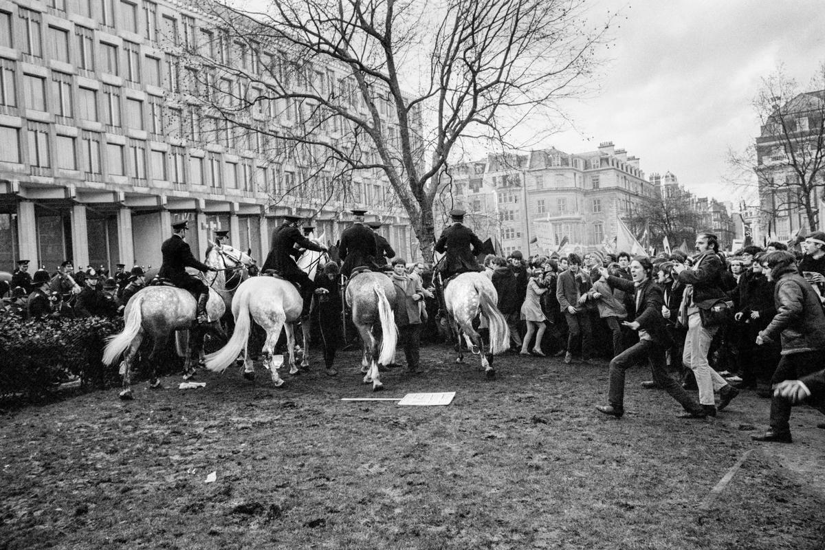 GB. ENGLAND. London. Trouble flared in Grosvenor Square, London, after an estimated 6,000 marchers faced up to police outside the United States Embassy. On March 17, an anti-war demonstration in Grosvenor Square, London, ended with 86 people injured and 200 demonstrators arrested The protesters had broken away from another, bigger, march against US involvement in Vietnam but were confronted by a wall of police. 1968.