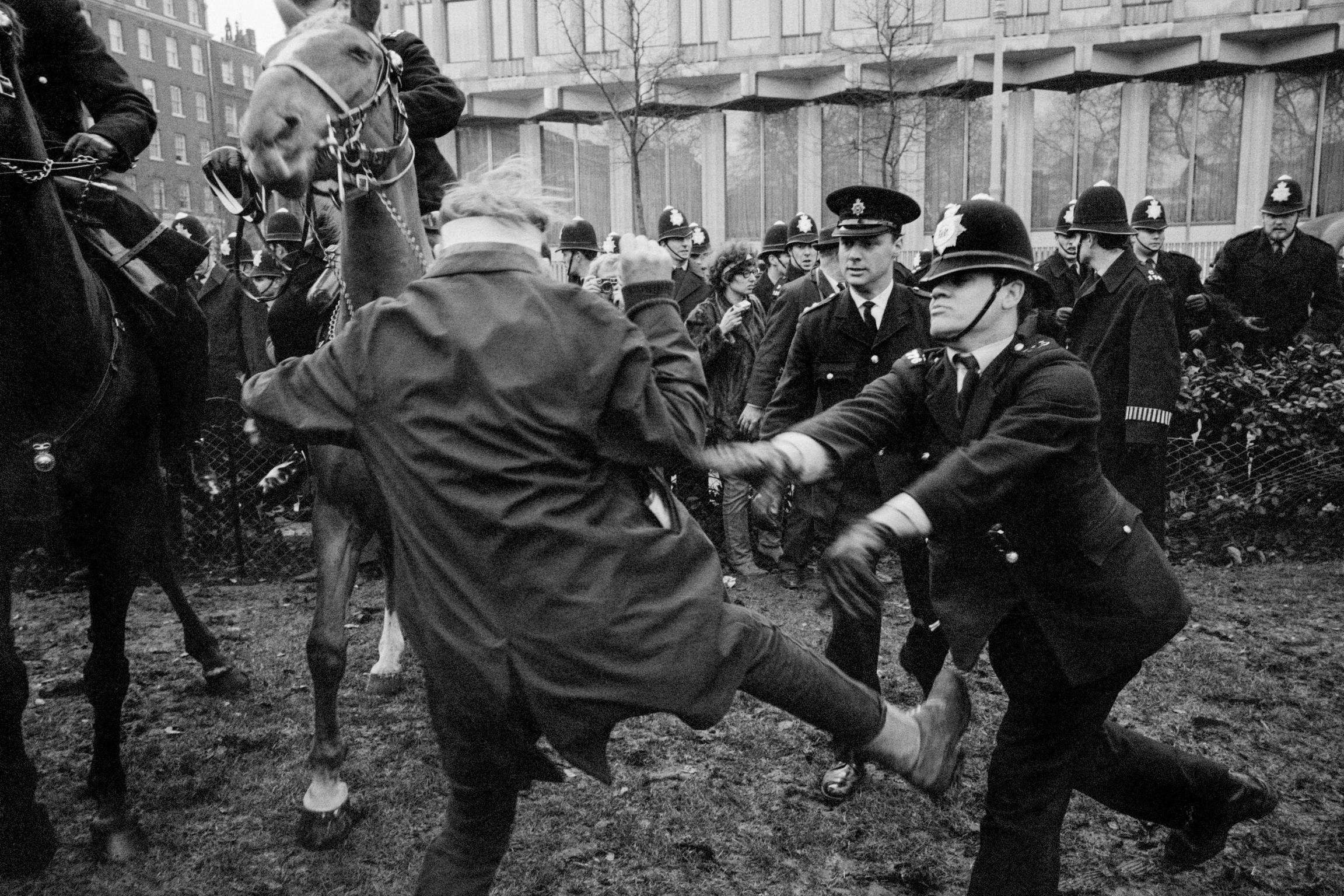 Trouble flared in Grosvenor Square, London, after an estimated 6,000 marchers faced up to police outside the United States Embassy