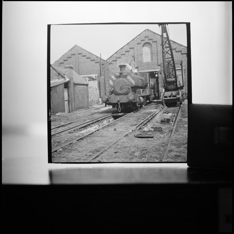 Black and white film negative showing an Andrew Barclay locomotive at a Blaenavon locomotive shed.  &#039;Loco Blaenavon&#039; is transcribed from original negative bag.