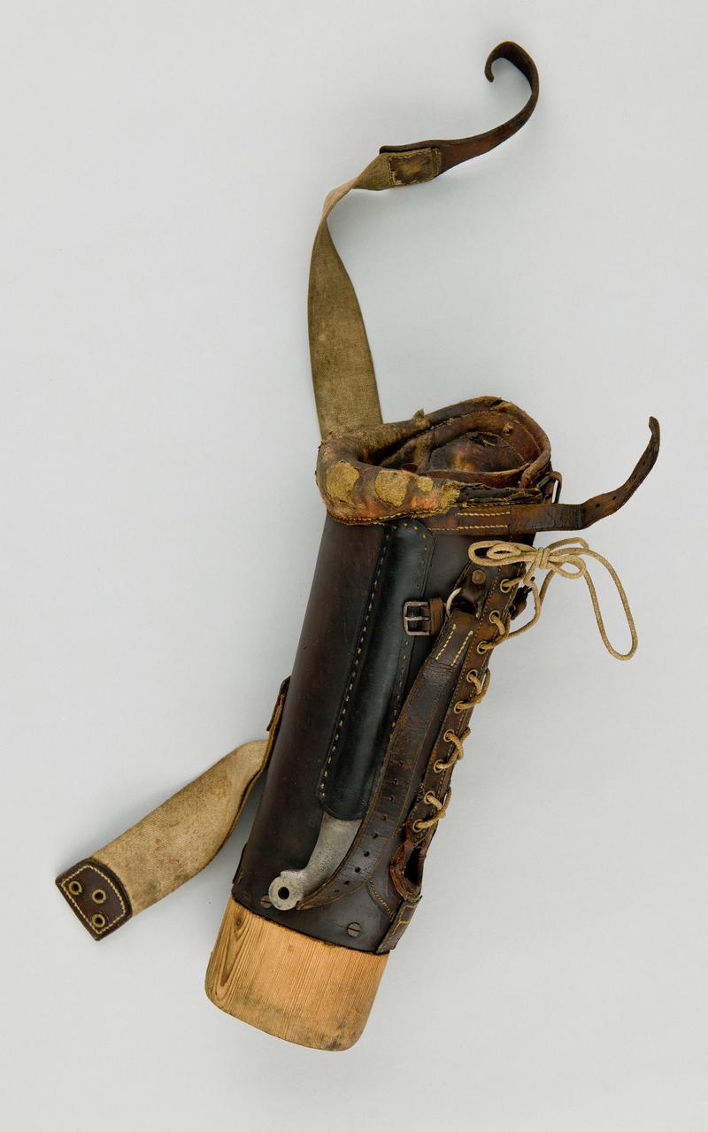 Prosthetic wooden leg with leather covering