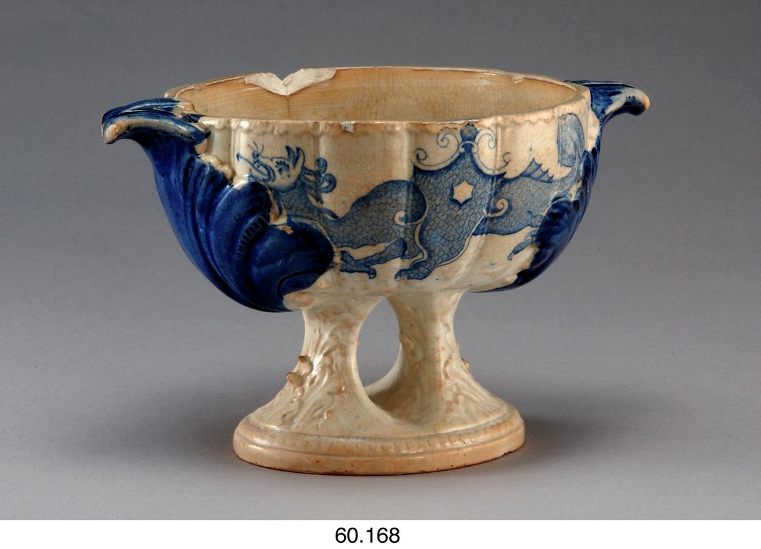 Bowl, earthenware, decorated in blue with dragon &amp; lotus design