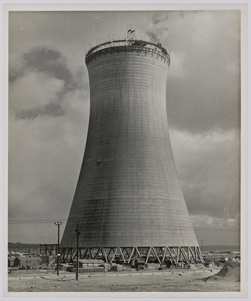 Concrete cooling tower under construction, Port Talbot. - Photograph of steelworks and South Wales [See also NMW A 57583 - close up of the top of the cooling tower under construction.]