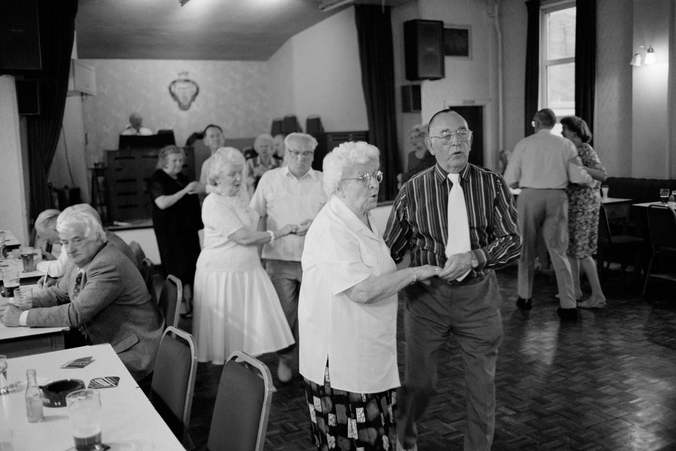 Seniors dance in the local social club. Cwm, Wales