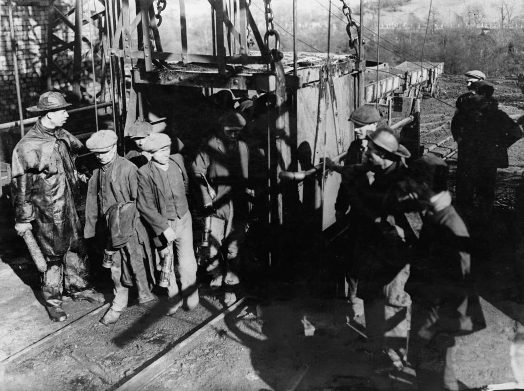 Cambrian Combine Strike. Miners leaving the mouth of the pit, on the eve of strike decision