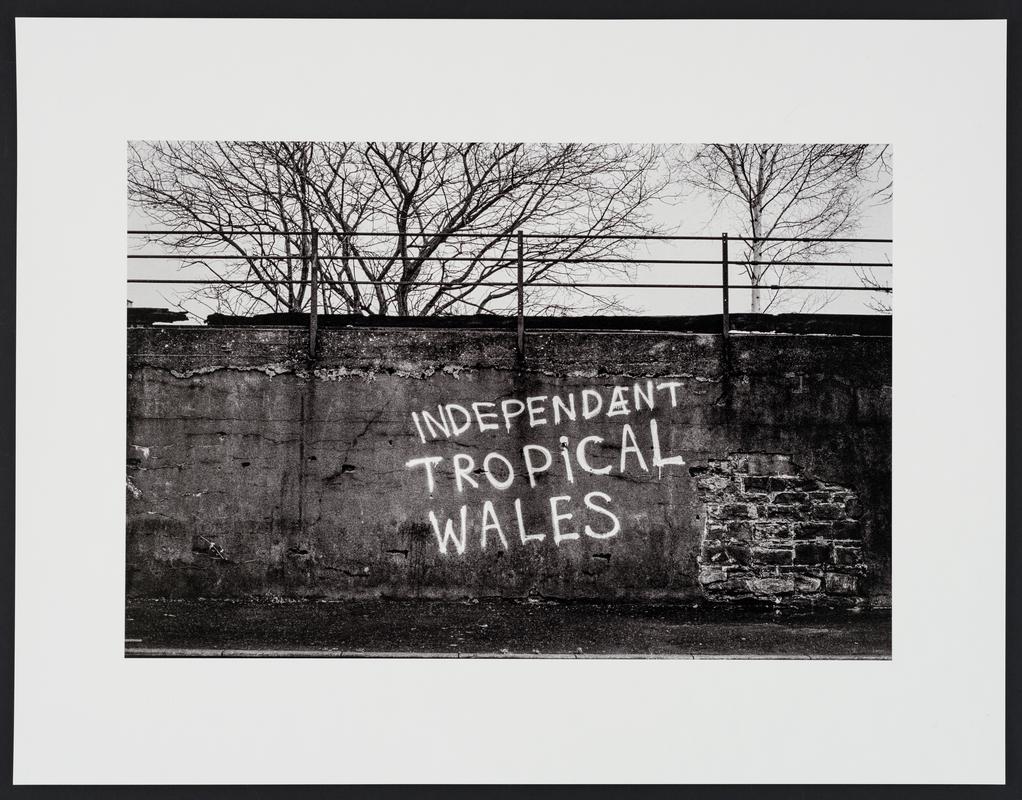 Graffiti on the railway wall, Bute Street, Butetown, Cardiff. Typical local humour. 1999