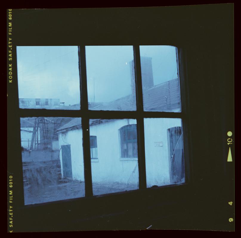 Colour film negative showing a view out of the manager&#039;s office window.