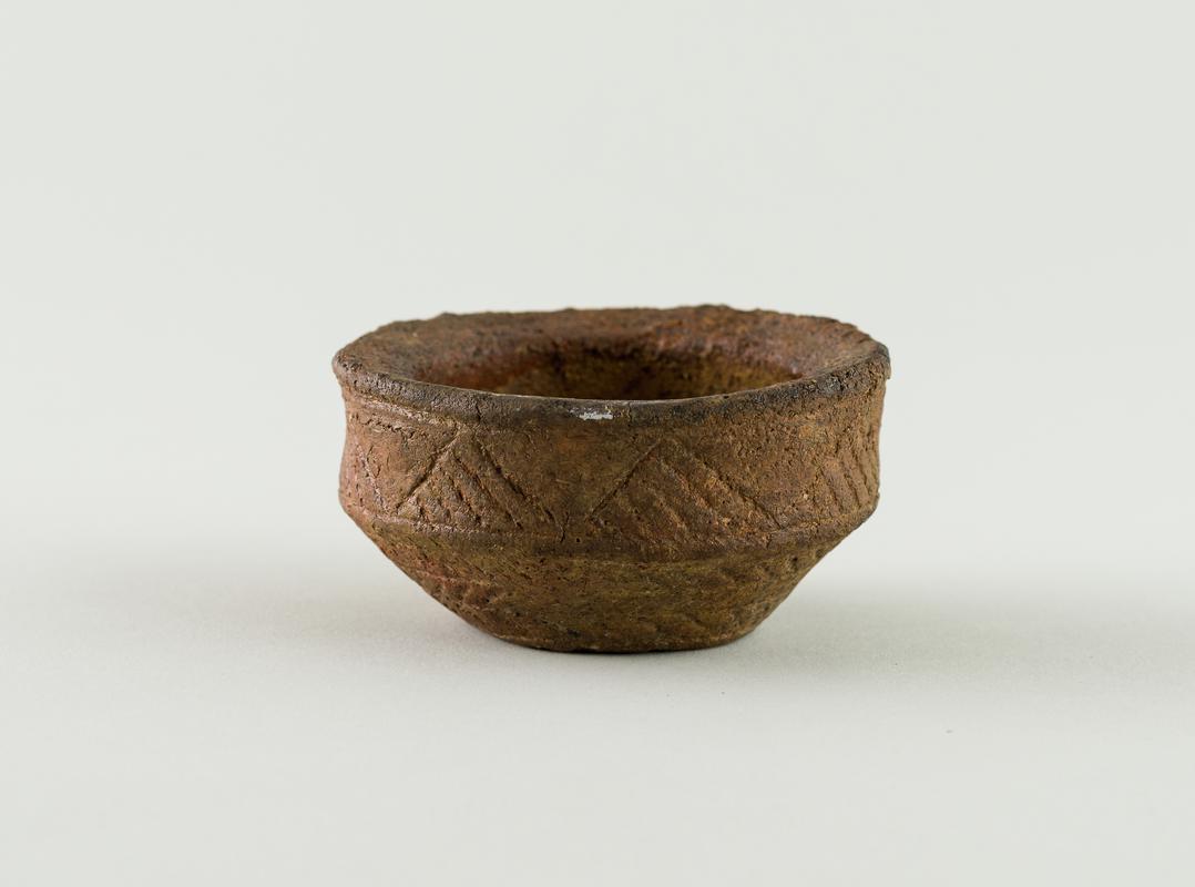 Early Bronze Age pottery minature vessel