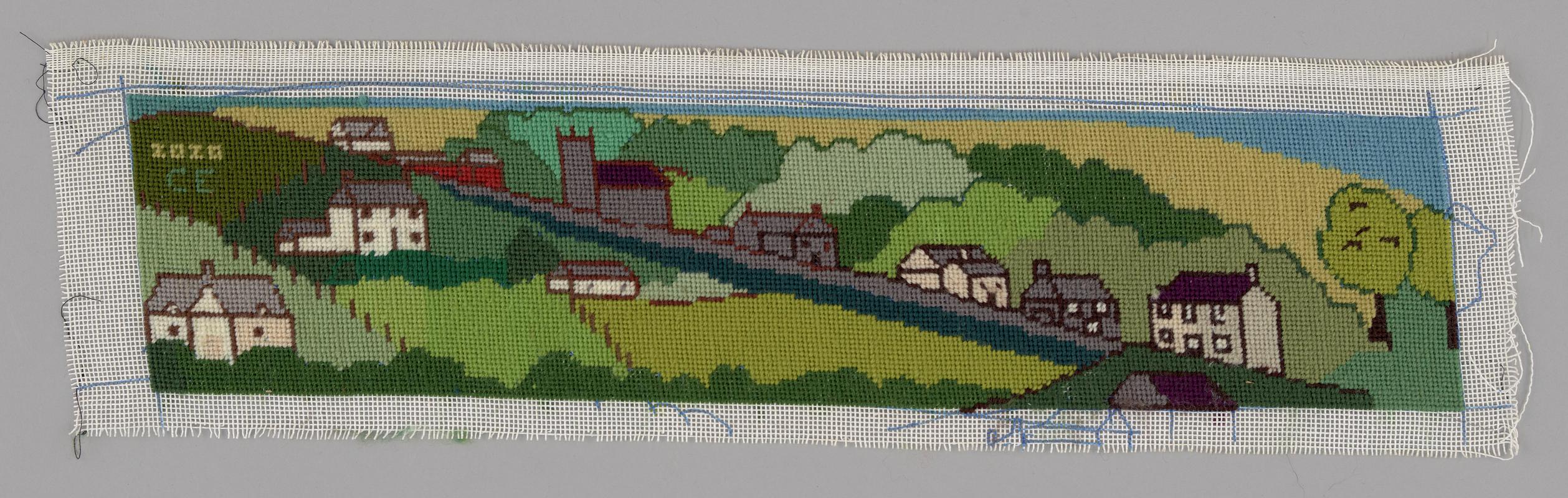 Needlework picture of Llanddeiniol village by Cathy Evans, 2020.