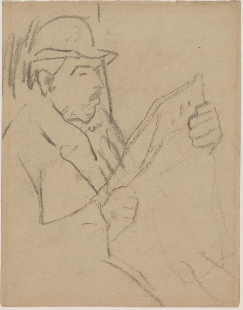 Old man in hat reading a newspaper