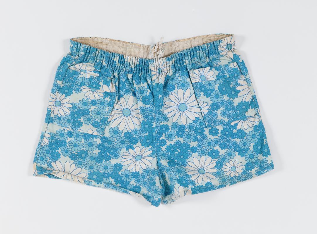 Blue floral shorts worn by Thalia Campbell on the march from Cardiff to Greenham Common, 27 August - 5 September 1981.
