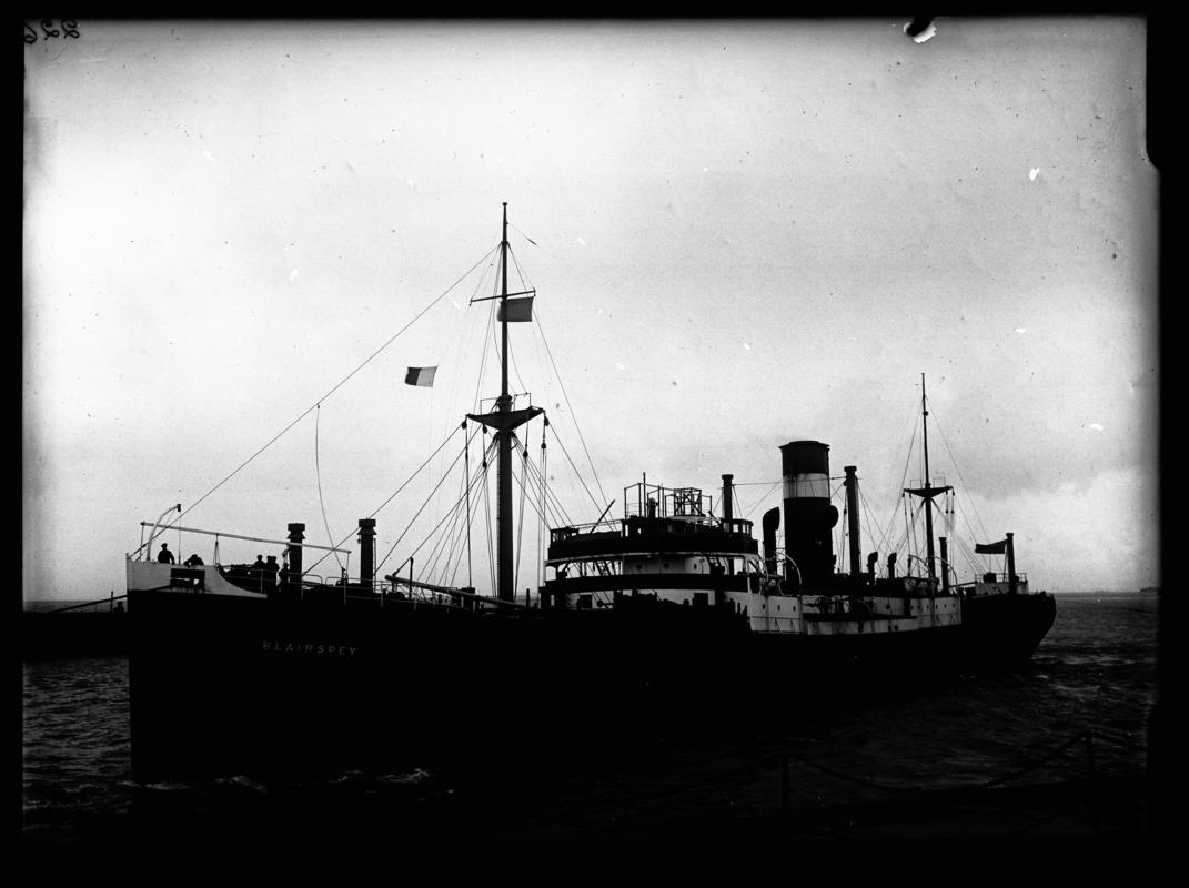 Port broadside view of S.S. BLAIRSPEY and watermans boat, c.1936.