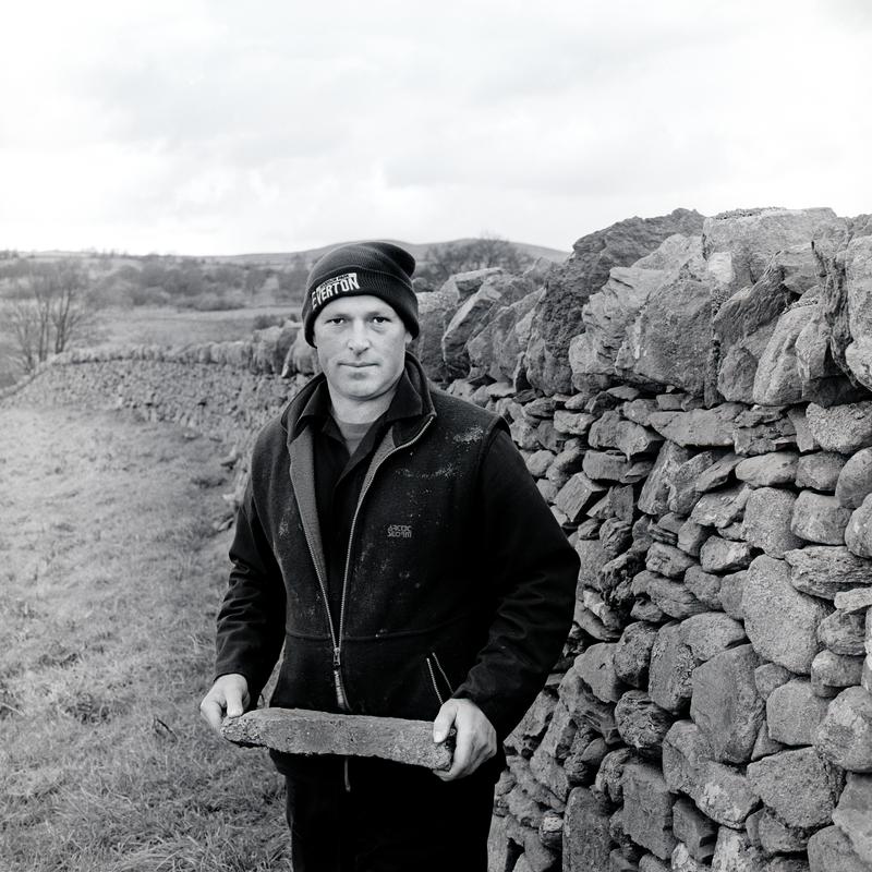 Alan Jones. Photo shot: Llangernyw, 6th November 2002. Place and date of birth: Denbigh 1964. Main occupation: Dry-stone Walling &amp; Stonemasonry. First Language: Welsh. Other languages: English. Lived in Wales: Always.