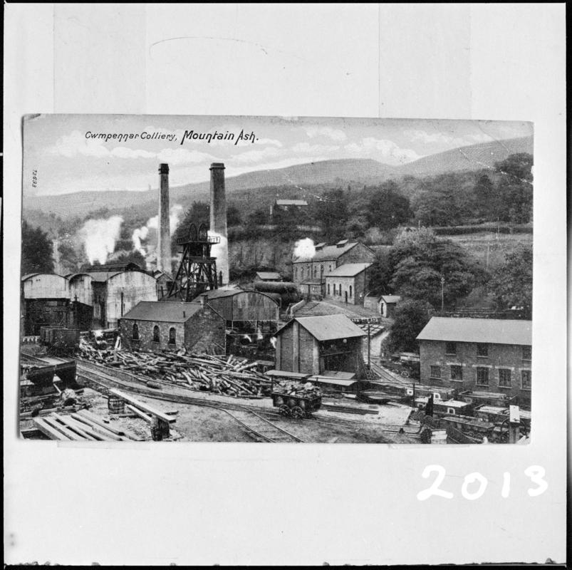 Black and white film negative of a postcard showing a general surface view of Cwmpennar Colliery, Mountain Ash.  &#039;Cwmpennar Mountain Ash&#039; is transcribed from original negative bag.