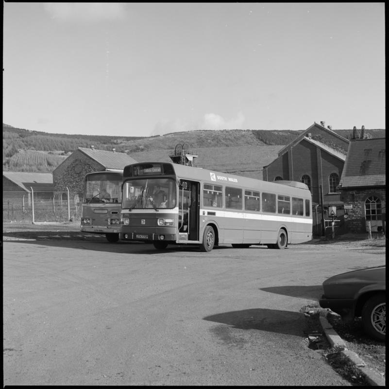 Black and white film negative showing two buses at St John&#039;s Colliery.
