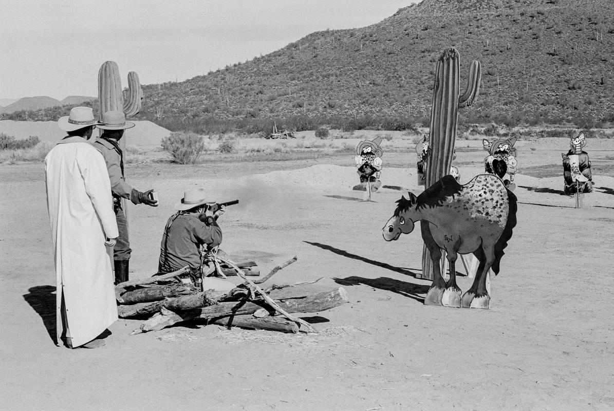 USA. ARIZONA. Cowboy Action Shooting. Winter Range, Phoenix. The National Old West Shooting  Competition is the meeting place for enthusiasts of the old west. Authenticity of the uniform, firearms, equipment and knowledge of the period is paramount. 1997.