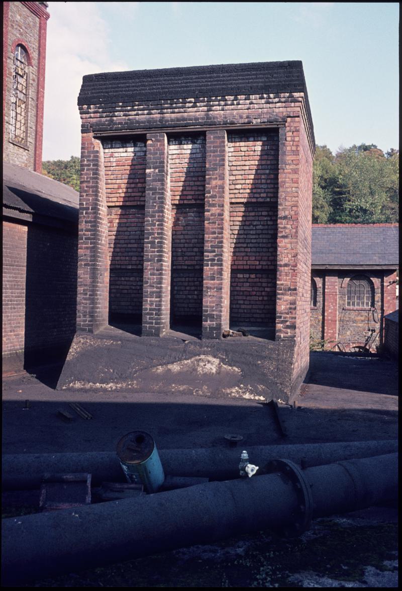 Colour film slide showing the brick built stack for the Sirocco fan, Celynen North Colliery.