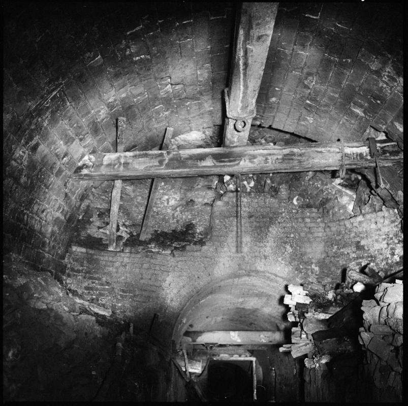 Black and white film negative showing the abandoned pit bottom, Big Pit 1975.