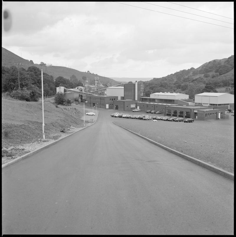 Black and white film negative showing Trelewis Mine offices with Taff Merthyr Colliery in the background.  &#039;Trelewis&#039; is transcribed from original negative bag.