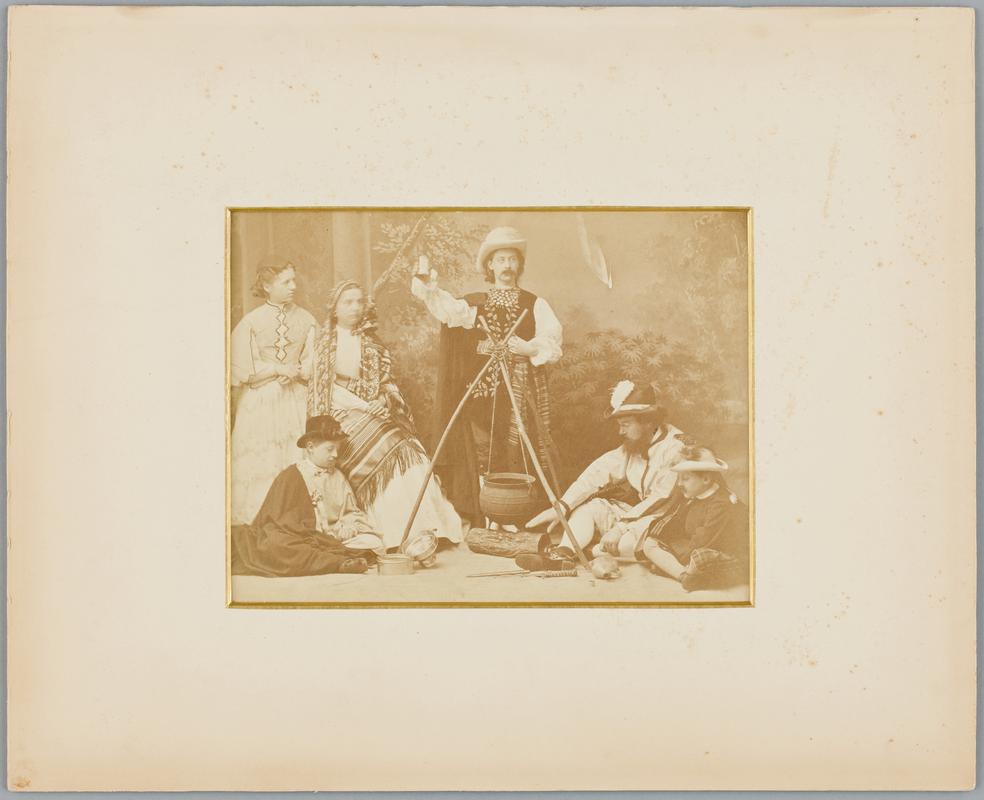 Unidentified studio portrait of six people in fancy dress, 1870s