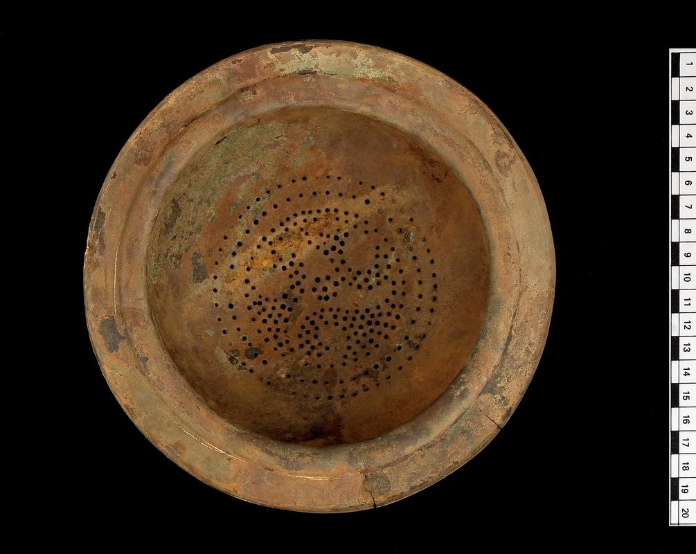 Iron Age copper alloy strainer