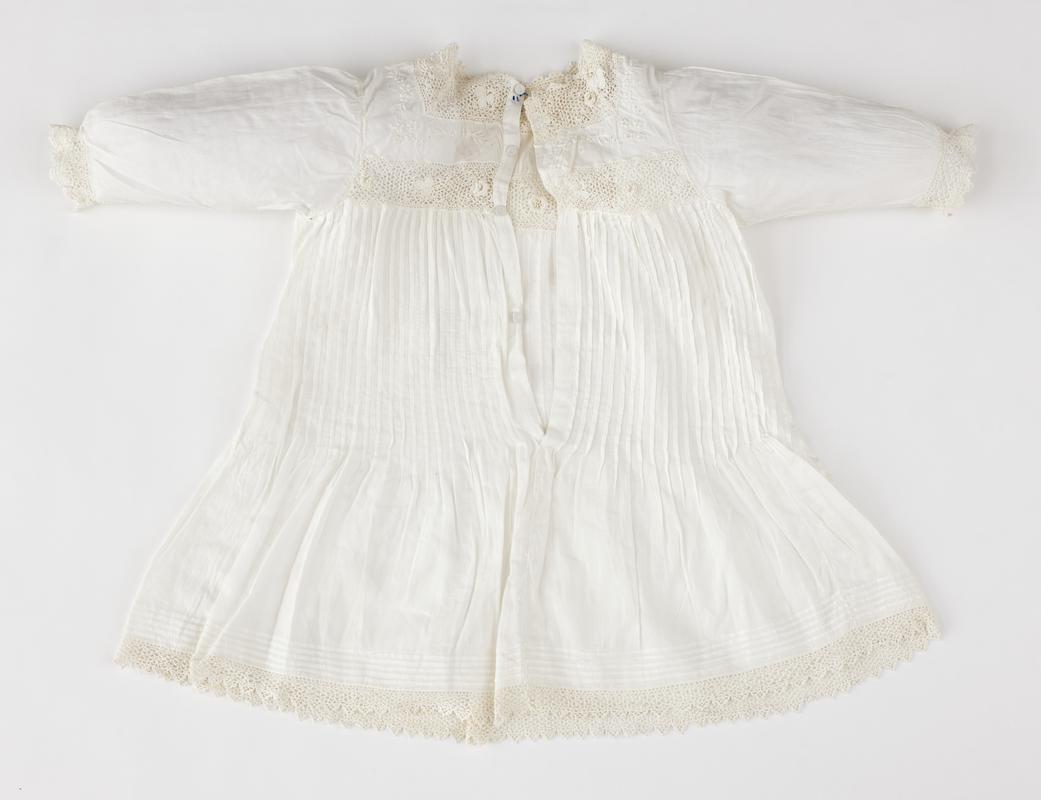 Baby&#039;s white cotton lawn frock with dropped waistline