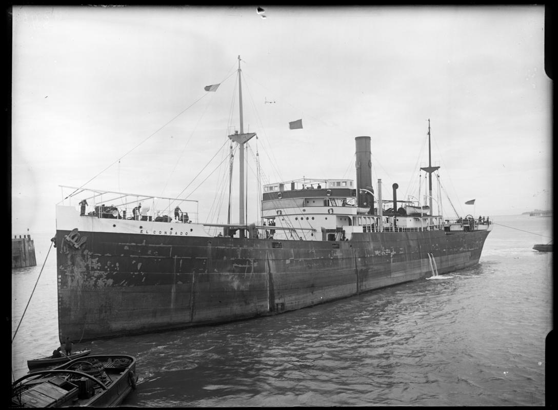 Three quarter Port bow view of S.S. EL CONDADO and waterman&#039;s boat, c.1936.
