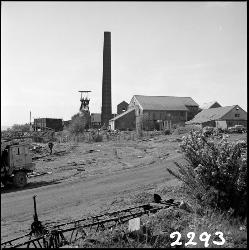 Black and white film negative showing a surface view of Morlais Colliery, 13 May 1981.  &#039;Morlais 13/5/81&#039; is transcribed from original negative bag.