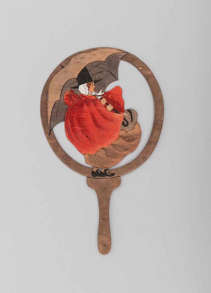 Painted plywood hand held fire-screen (or possibly story-telling paddle), with detachable handle, possibly depicting Jenny Jones.