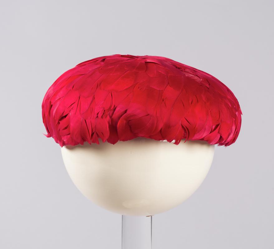 Small crimson feathered hat, 1950s.
