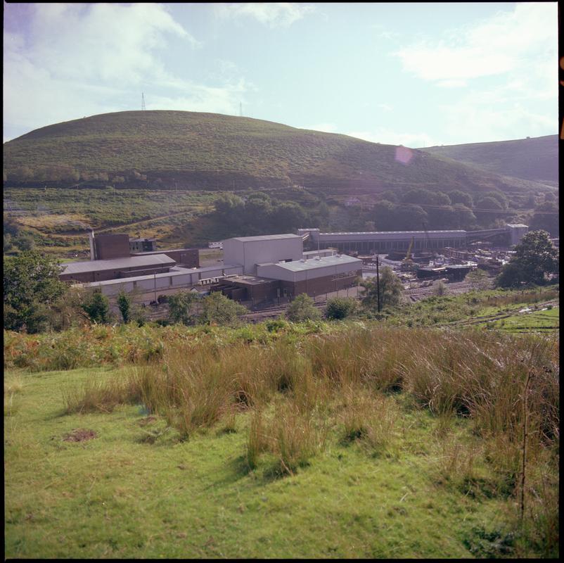 Colour film negative showing a view towards Trelewis Drift Mine.  &#039;Trelewis&#039; is transcribed from original negative bag.