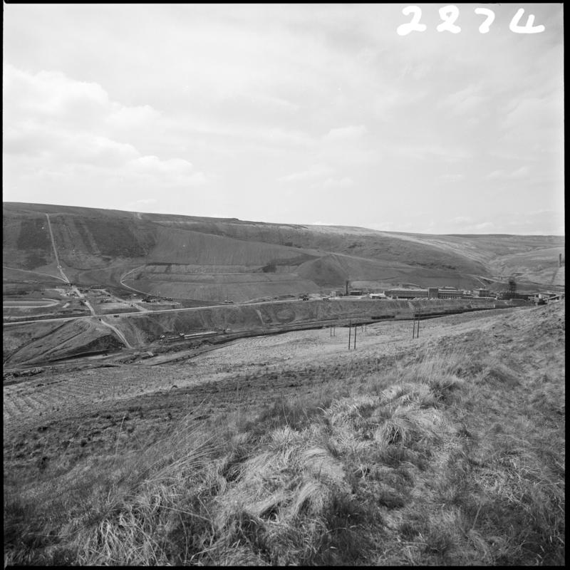 Black and white film negative showing a view towards Maerdy Colliery.