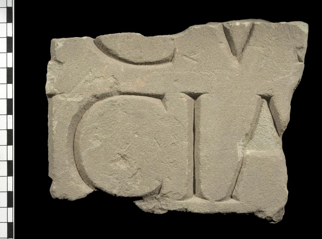 Stone tablet with inscription from fortress baths