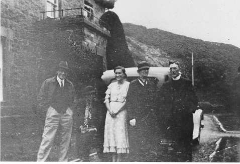 Dinorwig Quarry Hospital. Left to right: Gough Owen, Gough Owen&#039;s sister, Marie Therese Hughes, another of Gough Owen&#039;s sisters, the local Vicar (married to one of the sisters) - outside DQH. Note the entrance porch on front of building.