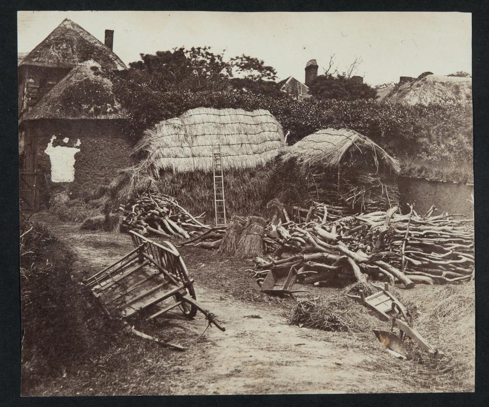 Hay stacks in farmyard