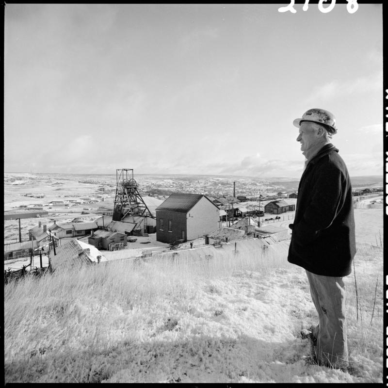 Black and white film negative showing Glyn Morgan, the final NCB manager on his last day, Big Pit Colliery 28 November 1980.  &#039;Blaenavon 28/11/80&#039; is transcribed from original negative bag.  Appears to be identical to 2009.3/1608.