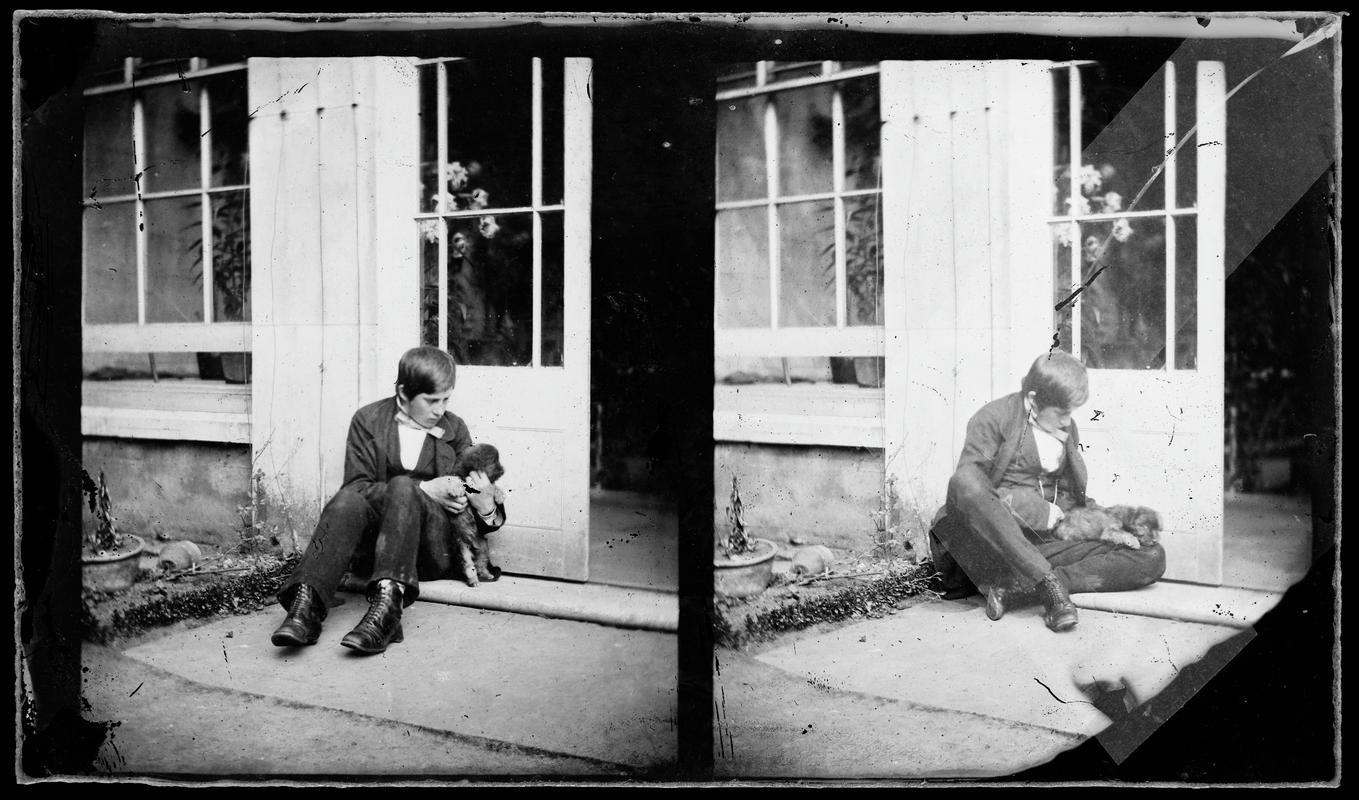 William Llewelyn with a dog, glass negative