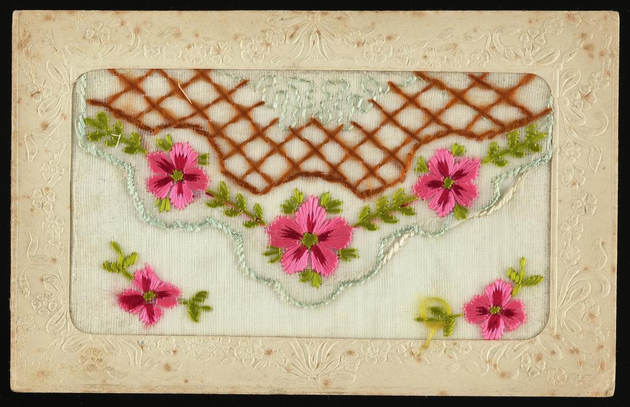 Embroidered postcard. Handwritten message on back. Sent to Miss Evelyn Hussey, sister of Corporal Hector Hussey of the Royal Welch Fusiliers, during the First World War.