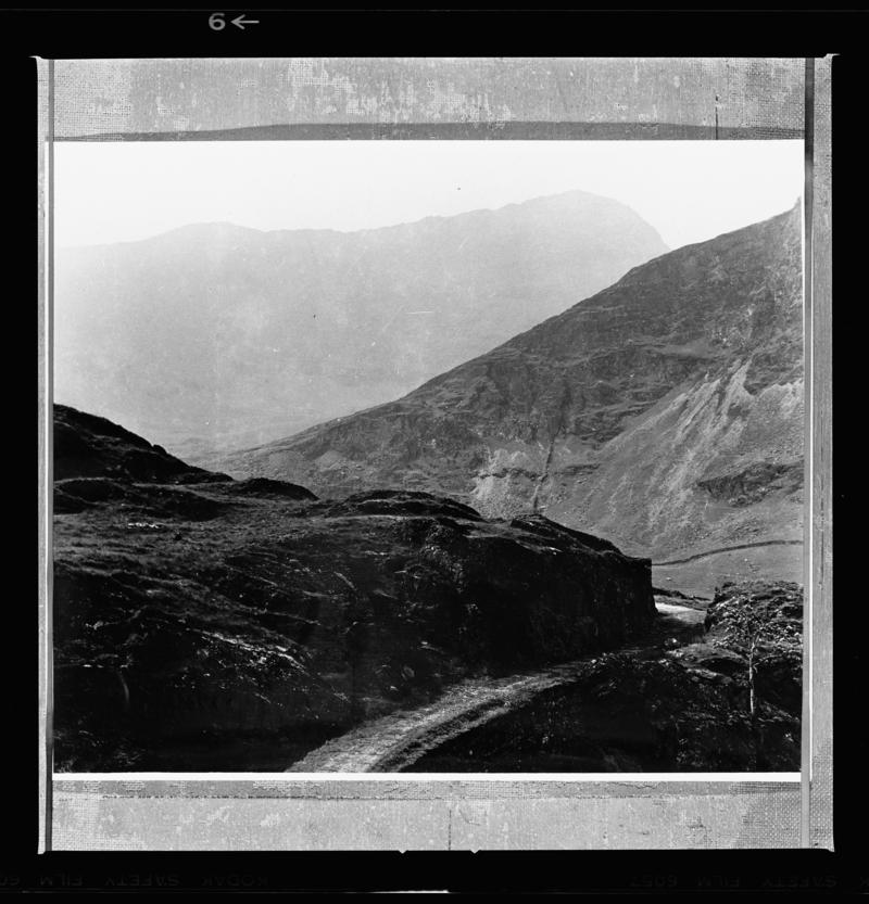 View of old quarry railway above Cwm y Llan, Snowdonia.



2014.35/47-49 appear on the same strip negative.

Print of this film negative is accessioned as 2014.35/61.
