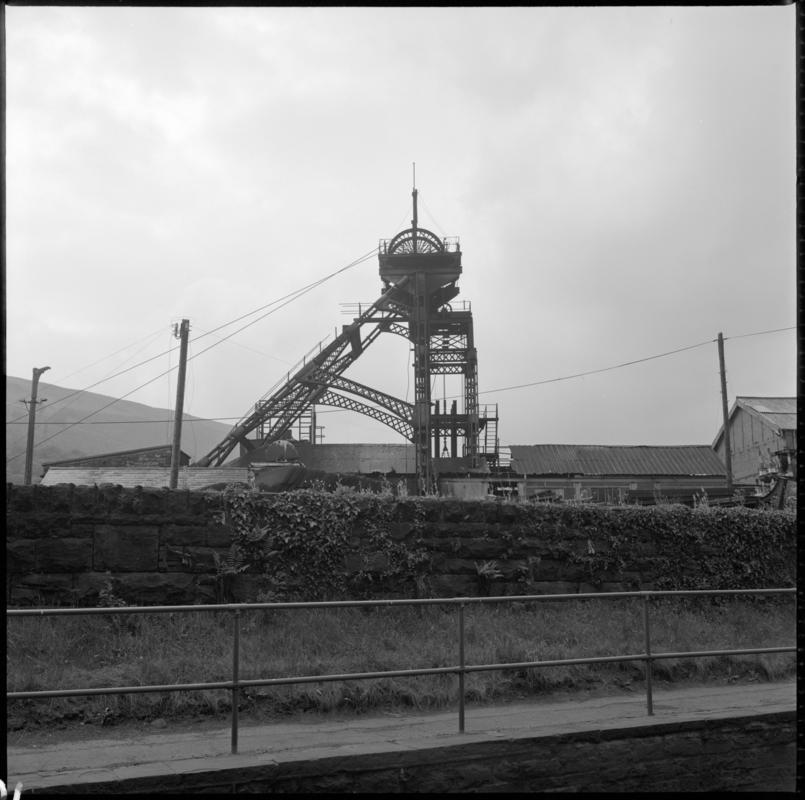 Black and white film negative showing a view of the headframe, Deep Duffryn Colliery 1975.  &#039;Deep Duffryn Glam 1975&#039; is transcribed from original negative bag.