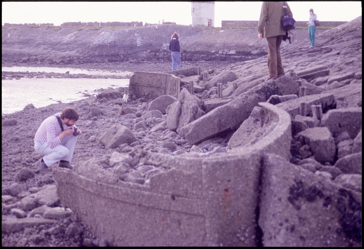 Remains of canal boats on east side of east breakwater at Burry Port Harbour, looking north, 1988.