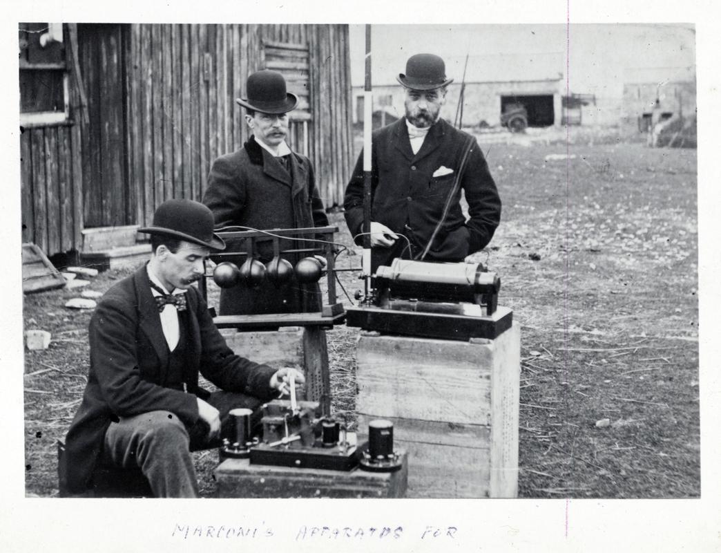 The original apparatus used by Marconi in his first experiments on transmission of wireless signals between Lavernock Point and the Flat Holm in 1897. The apparatus is being examined by Post Office Officials.