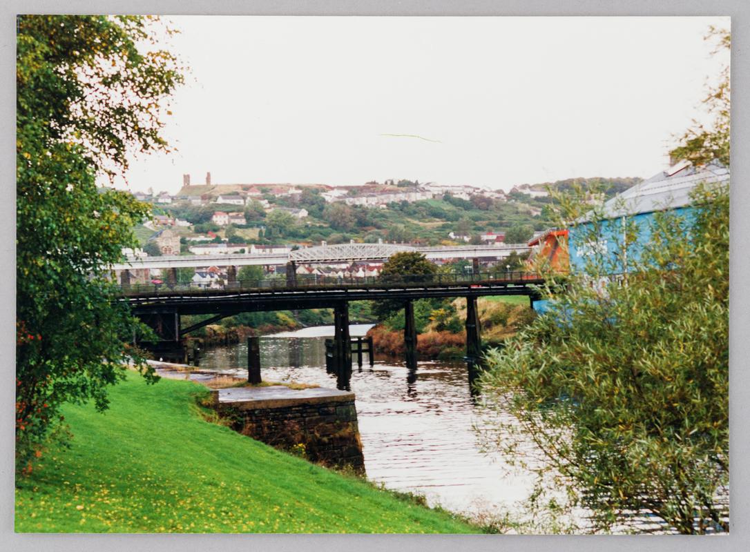 River Tawe looking north showing Morfa Bridge with Landore Viaduct beyond, October 1993.