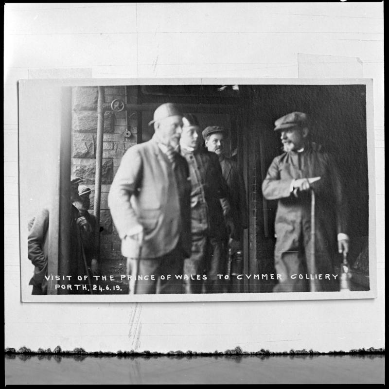 Black and white film negative of a photograph showing &#039;the visit of the Prince of Wales to Cymmer Colliery, Porth, 24 June 1919&#039;.  &#039;Cymmer Colliery, Prince of Wales 24/6/19&#039; is transcribed from original negative bag.
