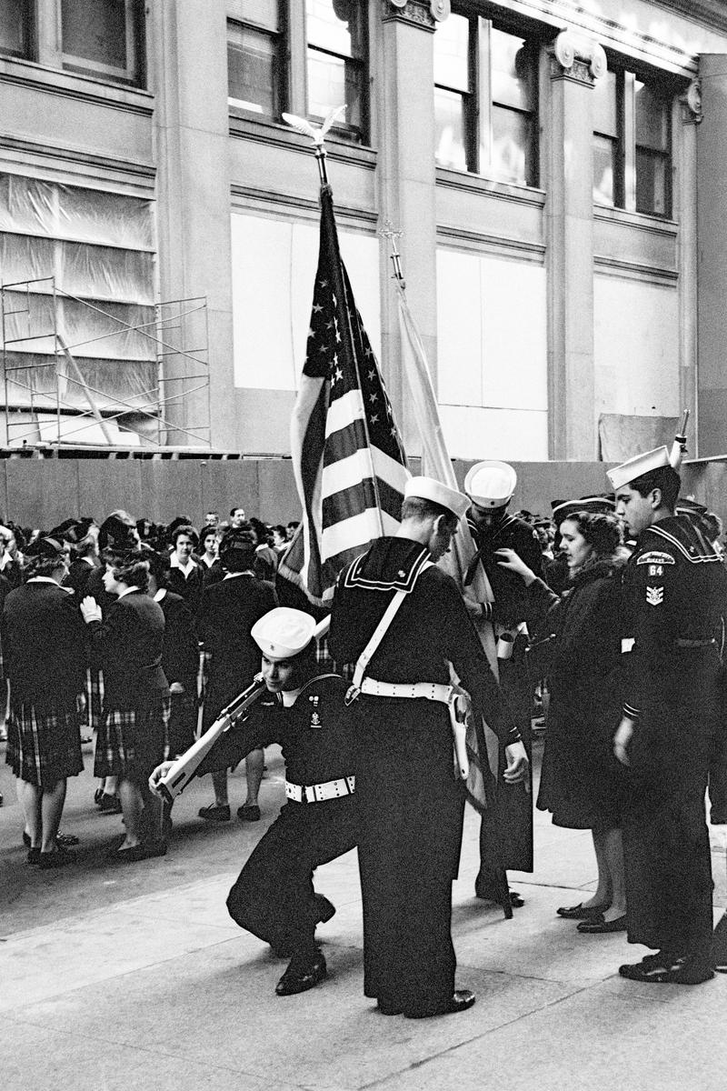USA. NEW YORK. Lower Manhattan. Getting ready for a street parade. Plus the American Flag. 1962.