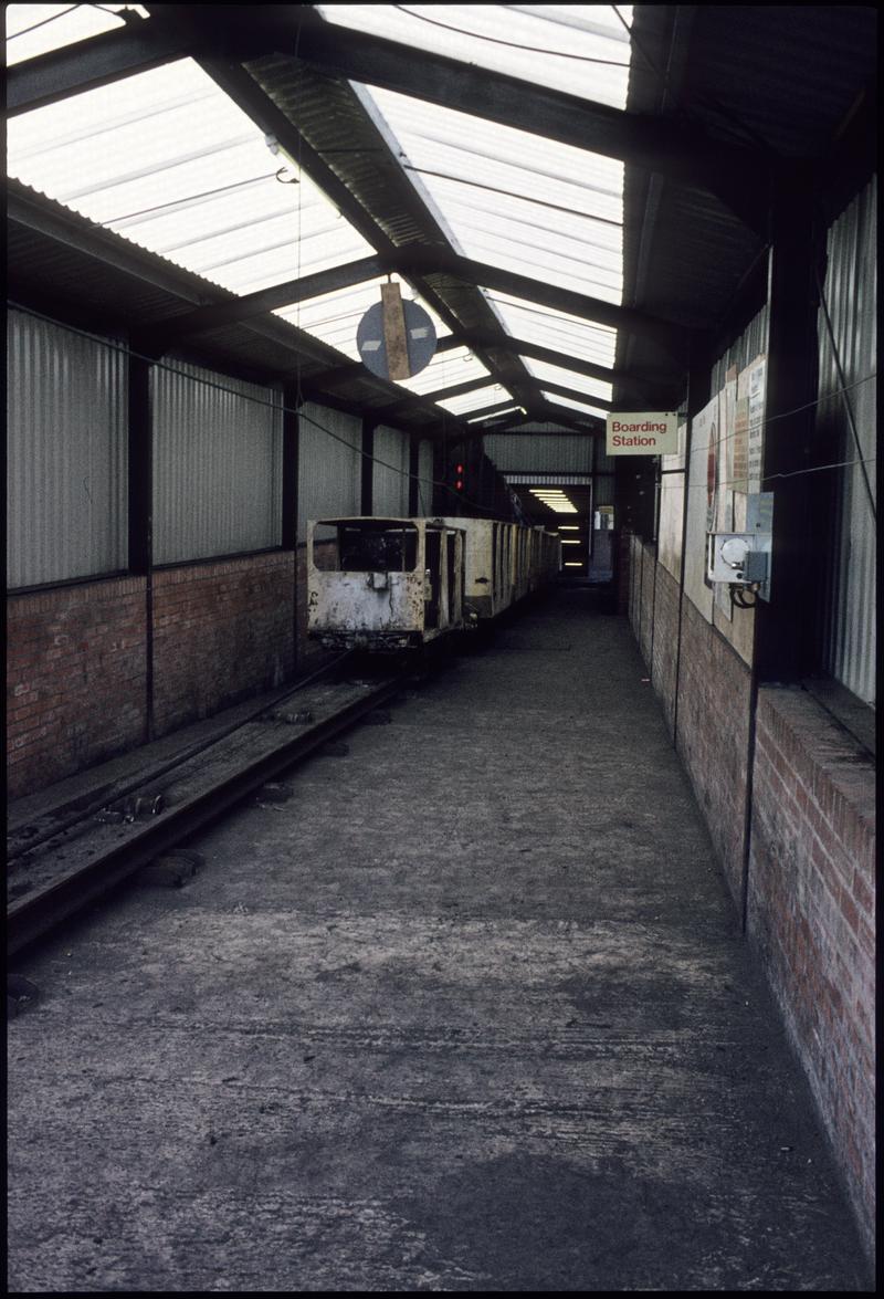 Colour film slide showing a manriding train and boarding station, Blaenant Colliery, 13 April 1977.