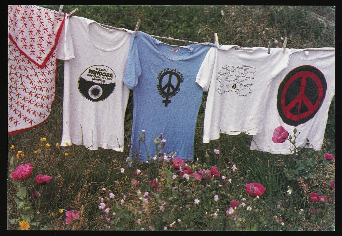 Colour postcard of a photograph of a Proud Washing Line in Wales July 3rd 1985, showing protest t-shirts on a washing line.