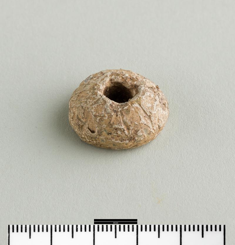 Early Medieval lead spindle whorl