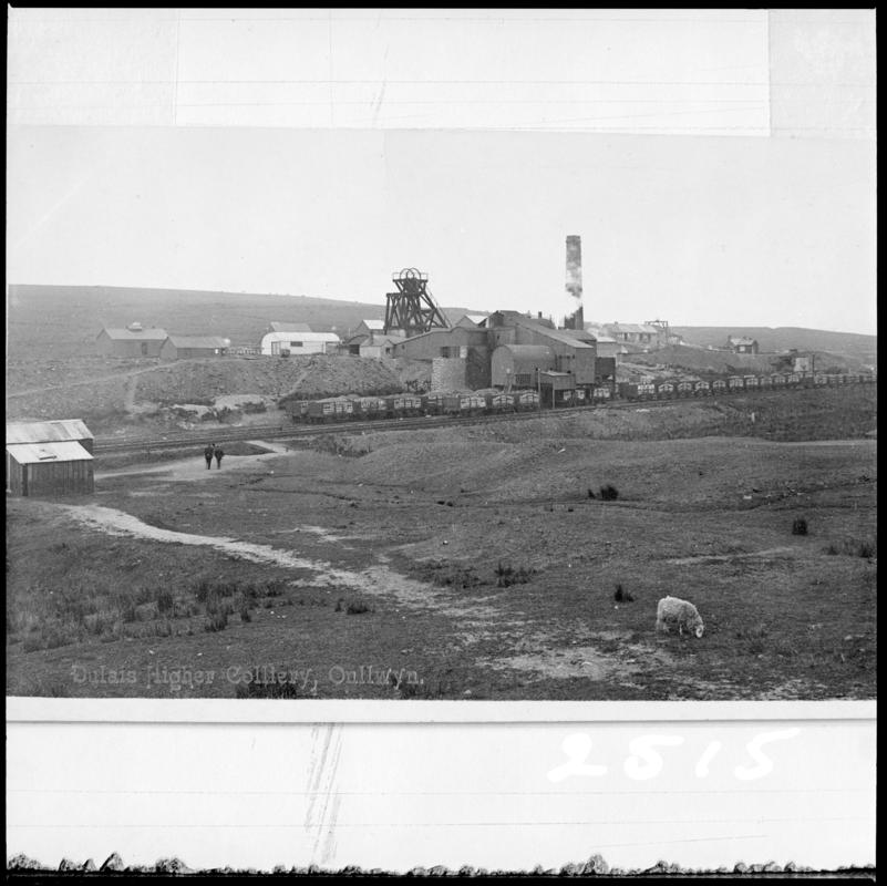 Black and white film negative of a photograph showing a surface view of Onllwyn Colliery. &#039;Dulais Higher Onllwyn&#039; is transcribed from original negative bag.