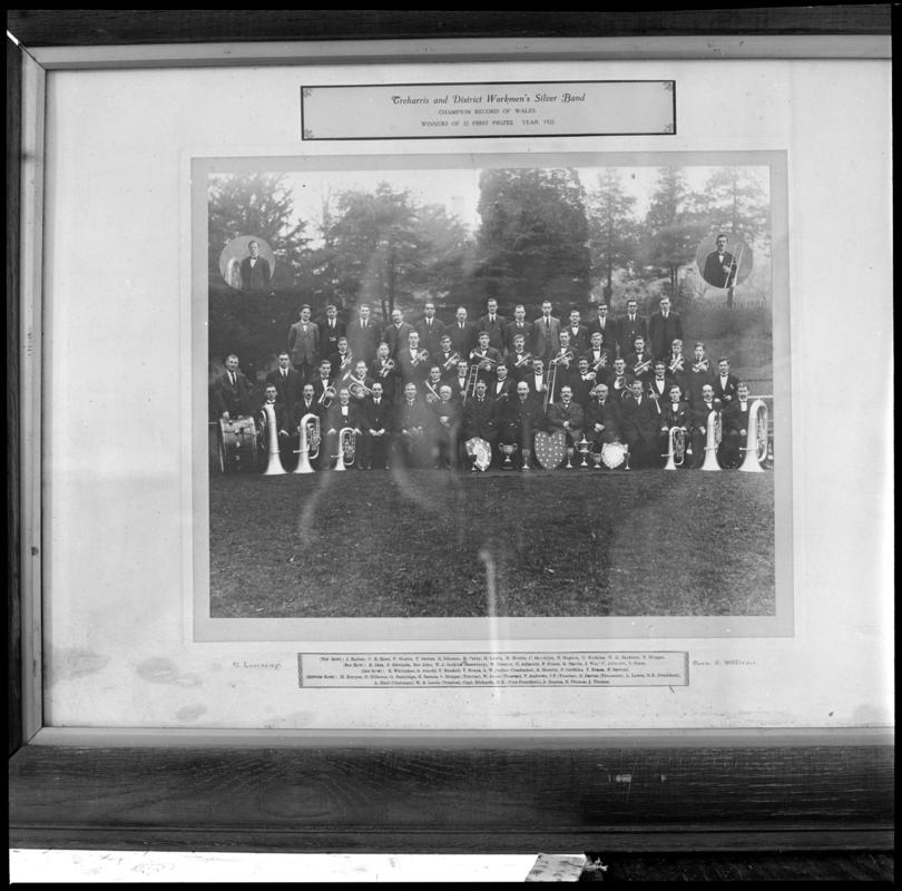 Black and white film negative of a framed photograph showing &#039;Treharris and District Workmen&#039;s Silver Band.  Year 1922&#039;.  Appears to be identical to 2009.3/1229.